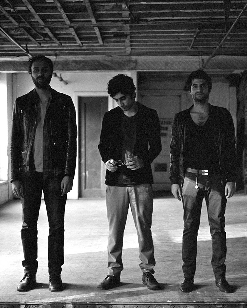Black and white photo of Dawn of Midi, an acoustic minimalist trio