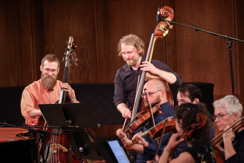 2025-Strauss-Performing-Arts-Orchestra-Double-basses-smiling