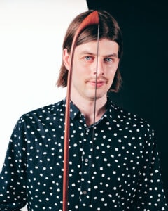 Kinnon Church holding bow